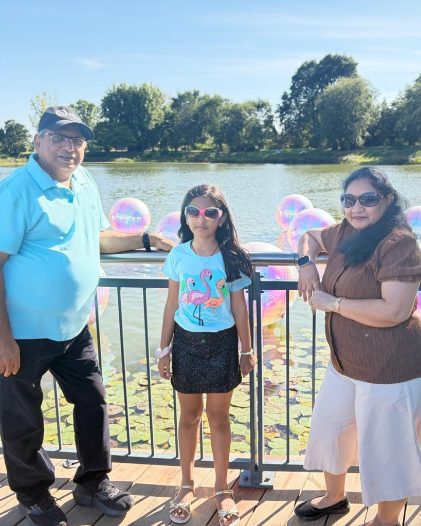 Grandparents with their grandchild outside