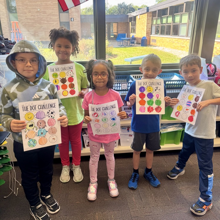 five students showing their Day Day artwork