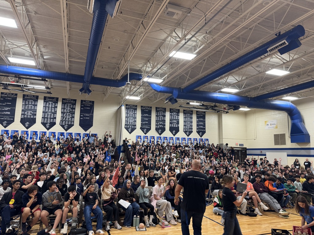 students engaged in an assembly