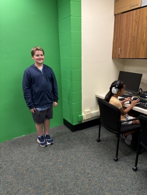 studio crew announcer standing ready to go