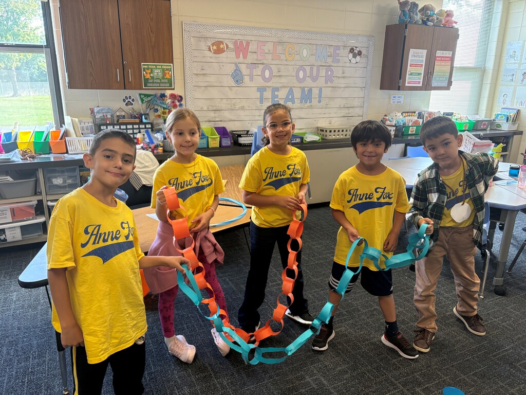 second graders doing a minute to win it game