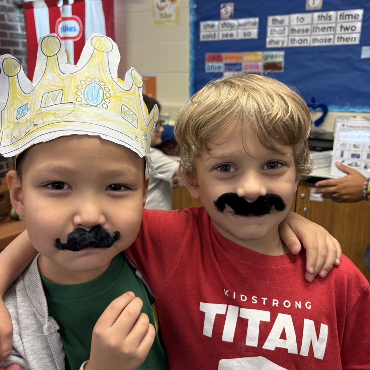 kindergartners with fake mustaches