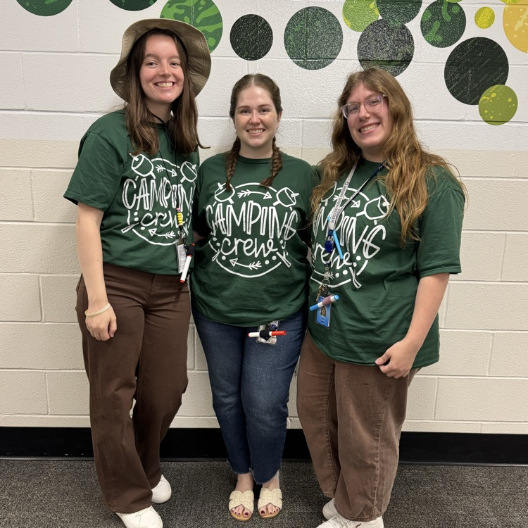 4th grade teachers in Camping Crew T-shirts.