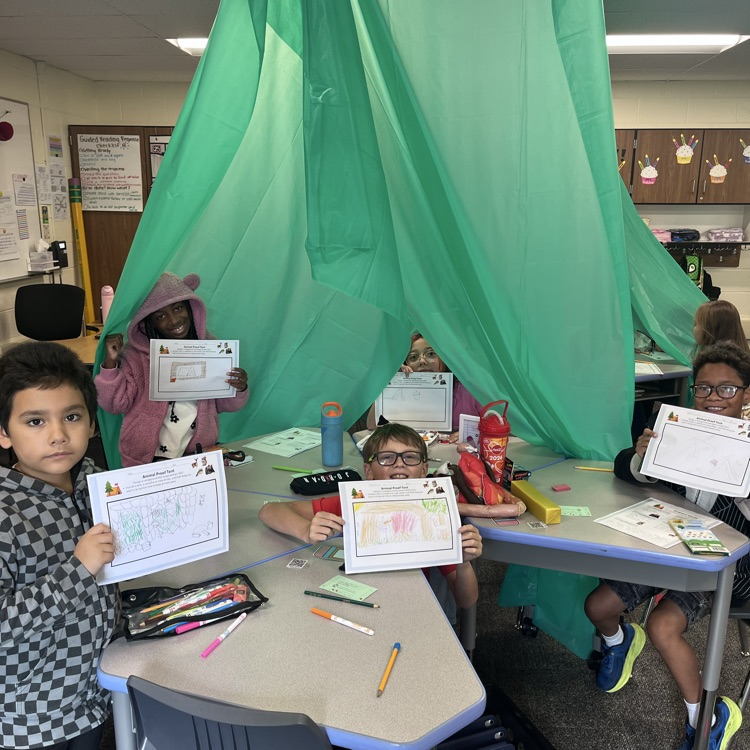 students showing their animal proof tent designs