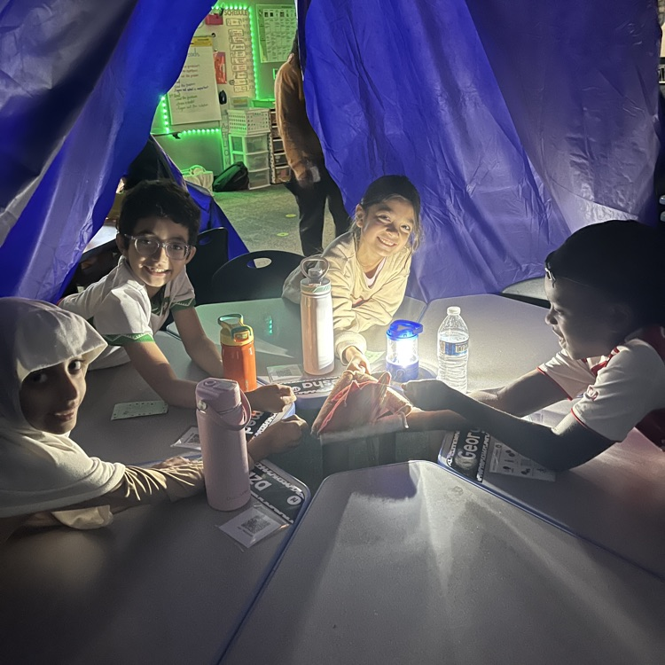 students in a tent
