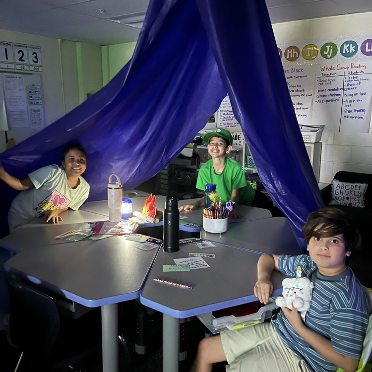 students in a tent