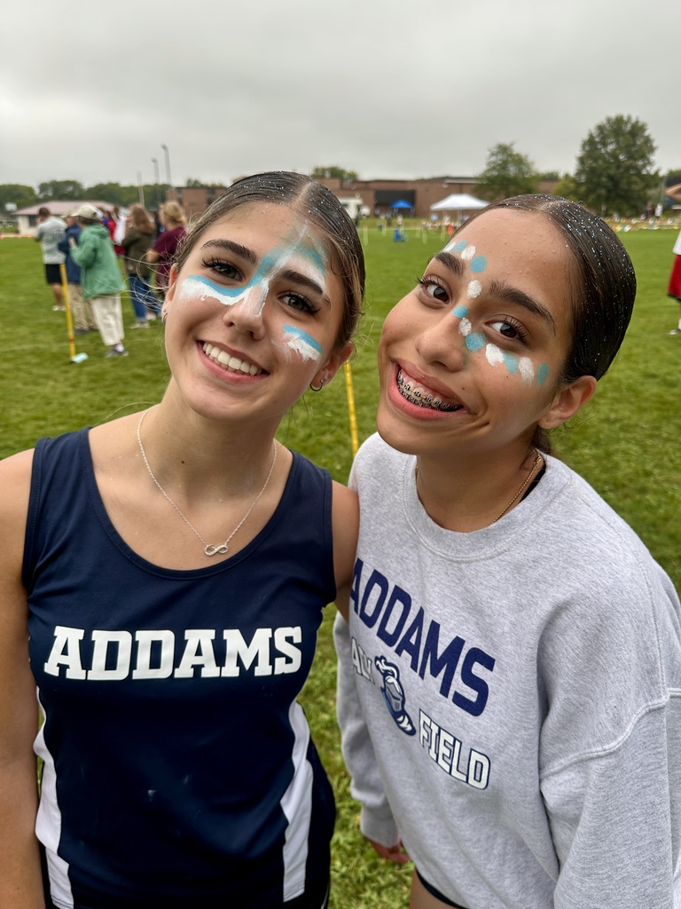 cross country runners posing for the camera