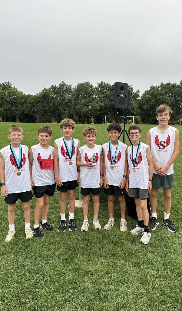 Cross Country runners celebrating their victory