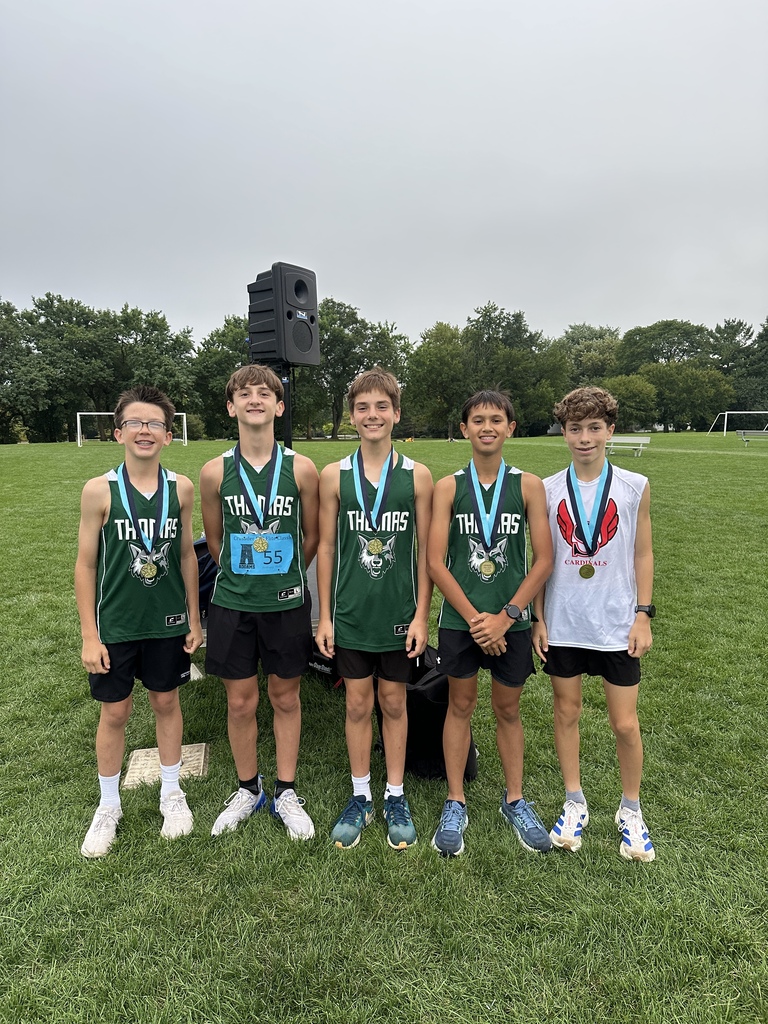 Cross Country runners celebrating their victory