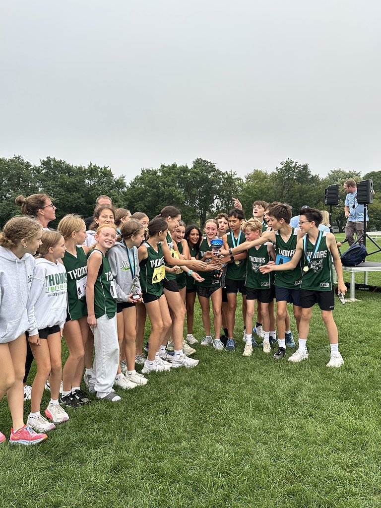 Cross Country runners celebrating their victory