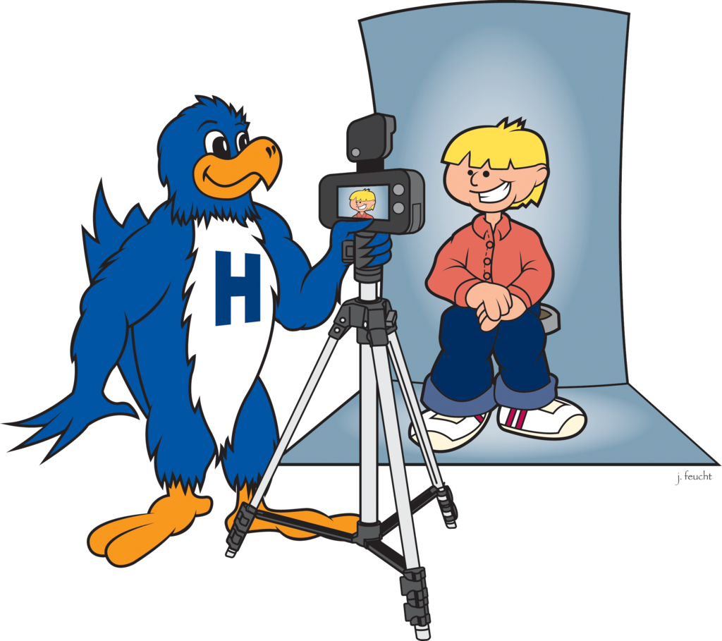 Herbie holding a camera for picture day