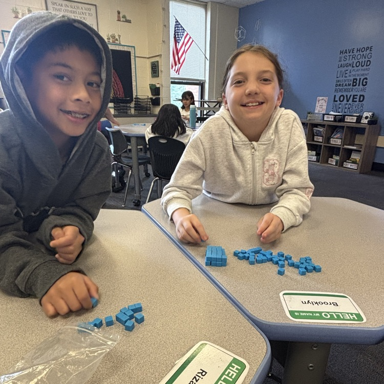 students using blocks to explore the concept of area