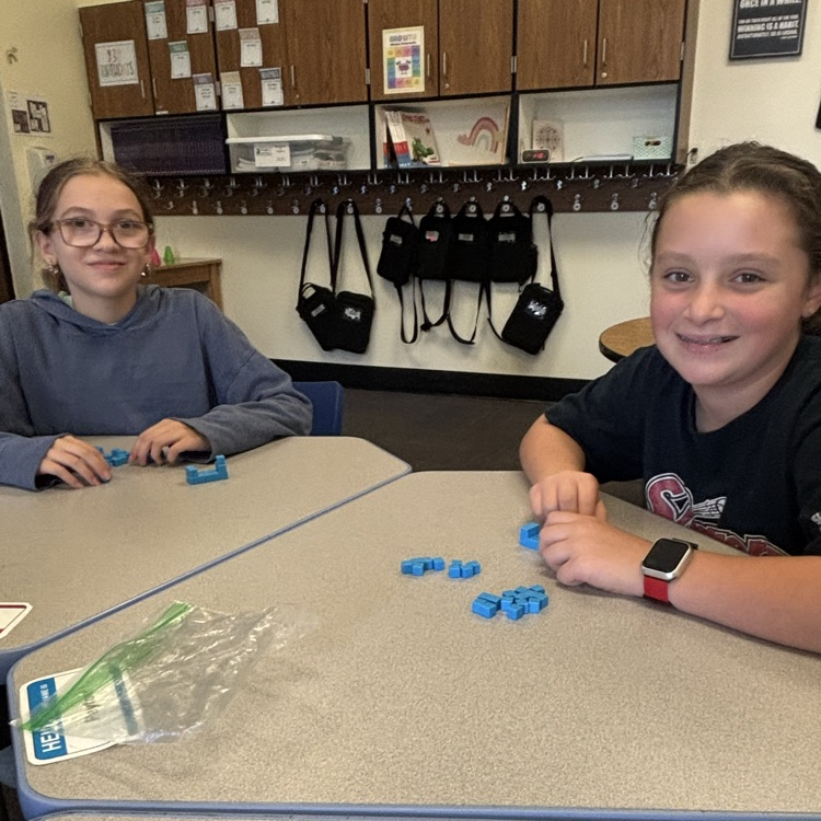 students using blocks to explore the concept of area