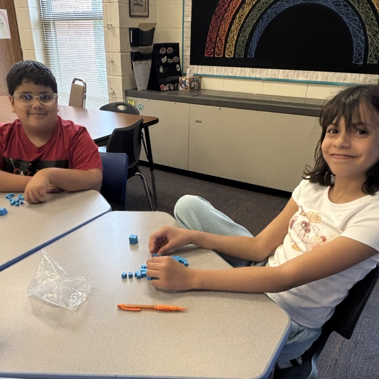 students using blocks to explore the concept of area