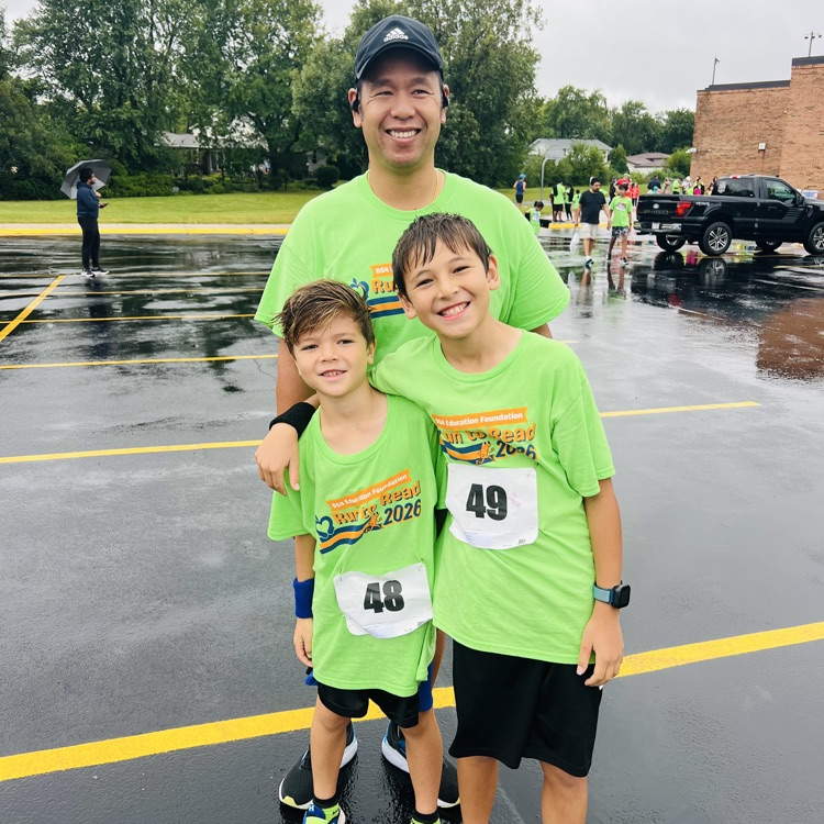 Students with family at the Run to Read event. 