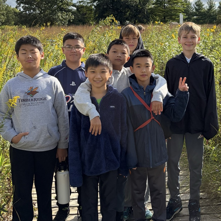 students standing on the trail at Spring Valley
