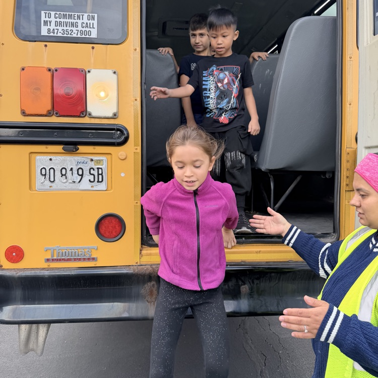 Student getting off the bus.