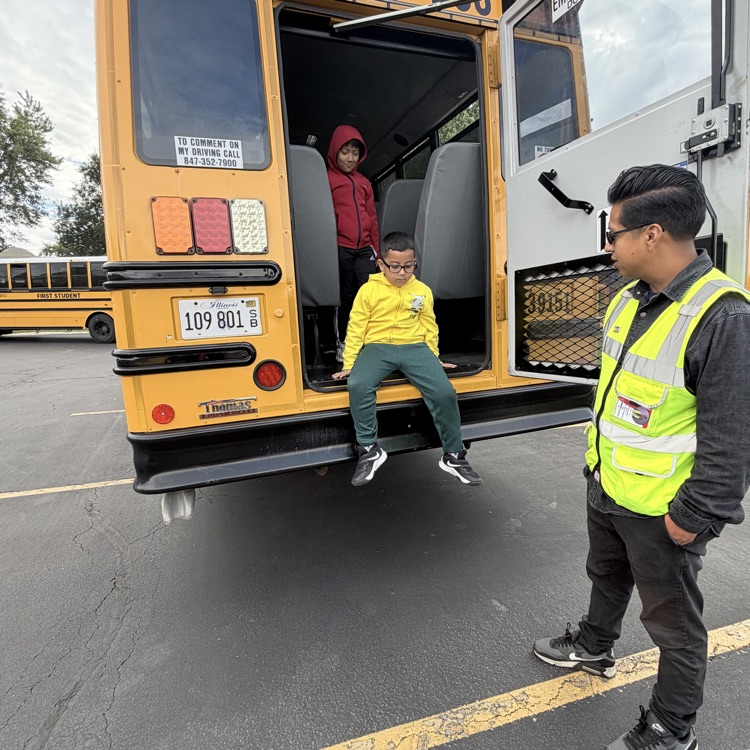 Student getting off the bus.