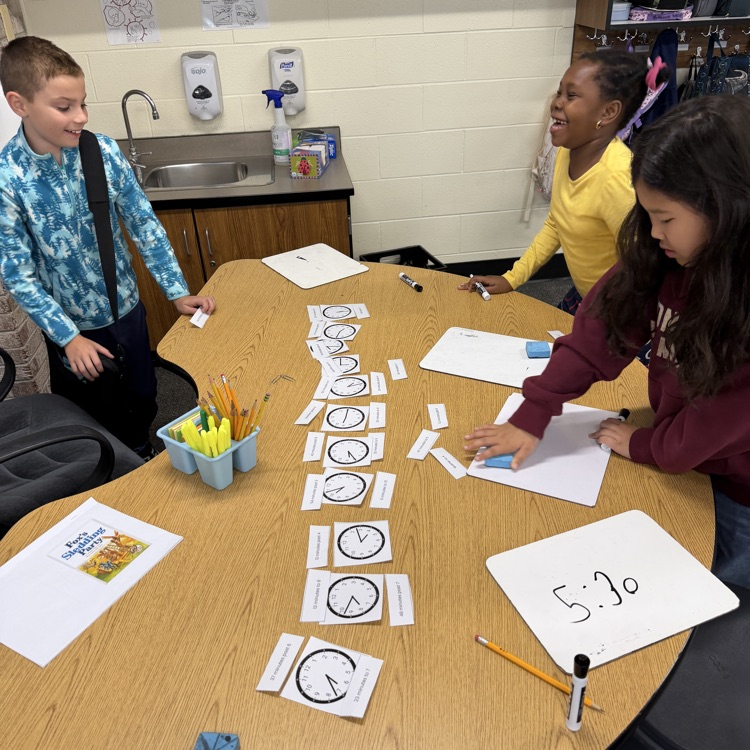 students matching clocks and times