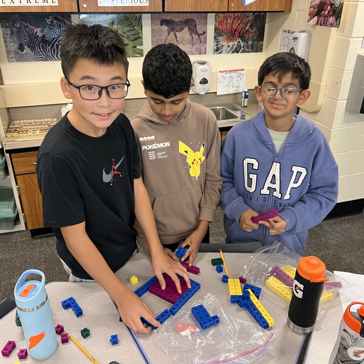 students building cubes