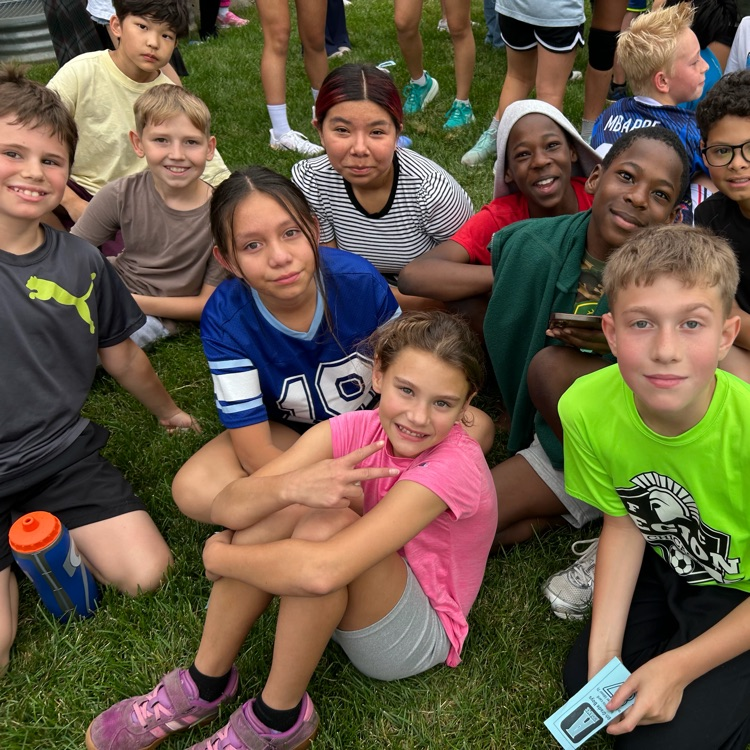 Sixth graders posing for a picture at the cross country invite