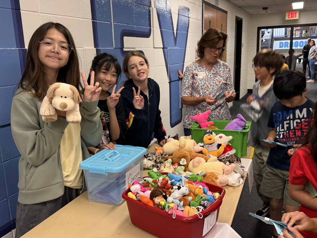 Students working and shopping PBIS store