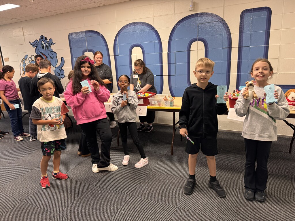 Students shopping PBIS store with stamp cards