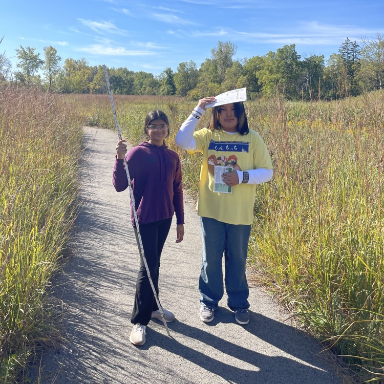 students walking on a path