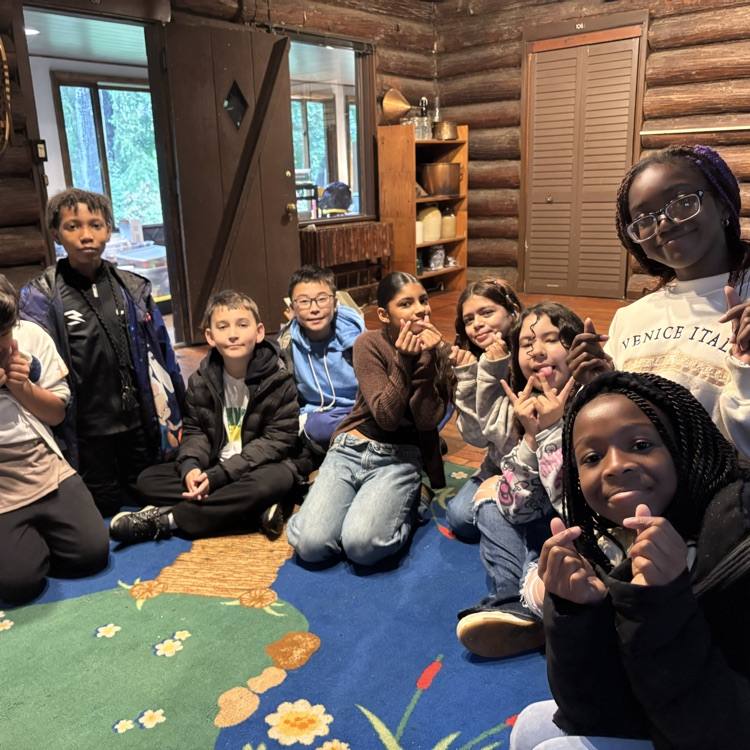 students sitting in a cabin