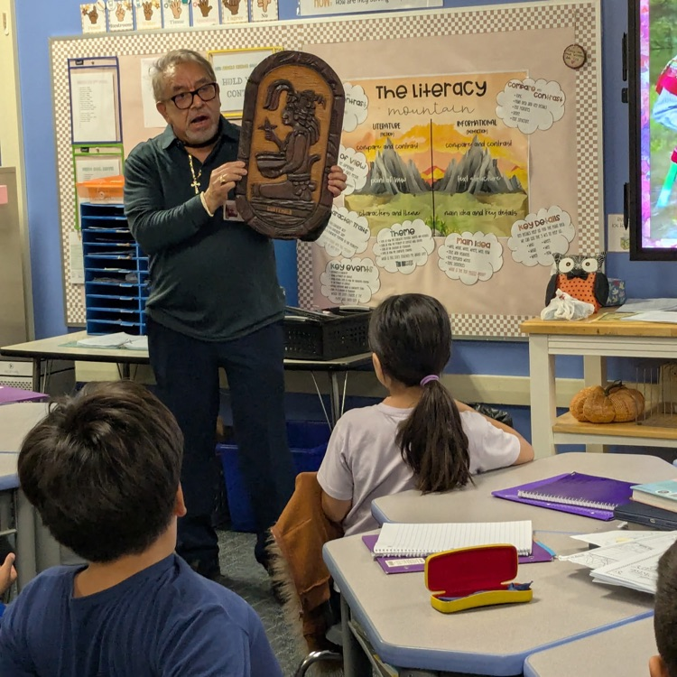 A 3rd grader’s grandfather teaching the class about Guatemala.