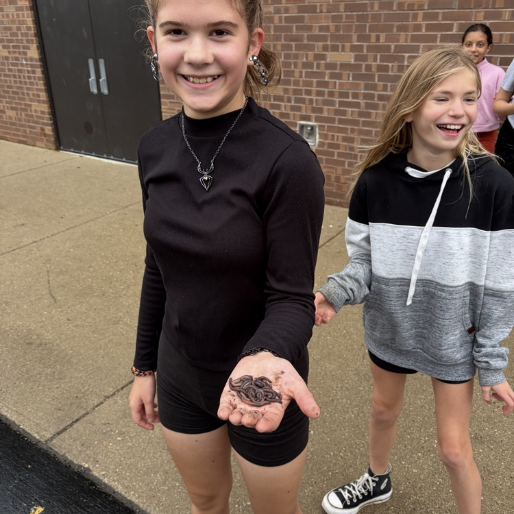 Student holding worms! 