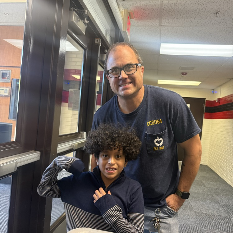 Custodian with student