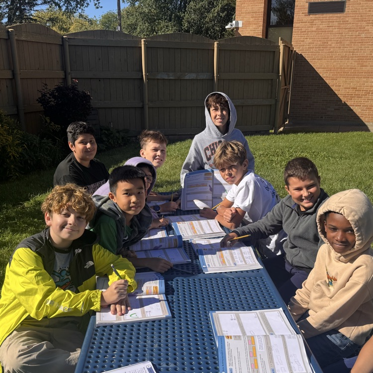 students working on math outside 