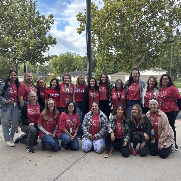 Staff members wearing their solidarity shirts! 