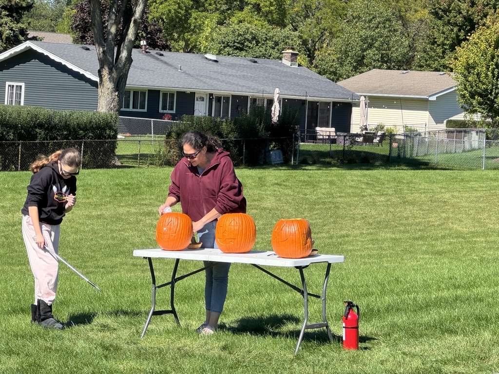 A student and a teacher create a chemical reaction to make a self-carving pumpkin