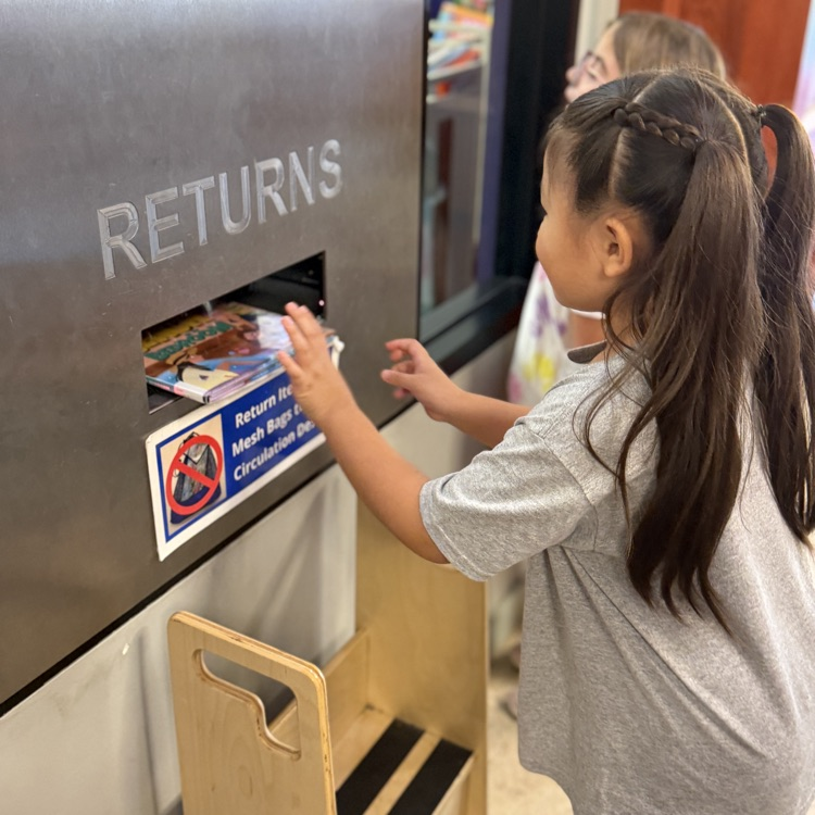 Students returning books