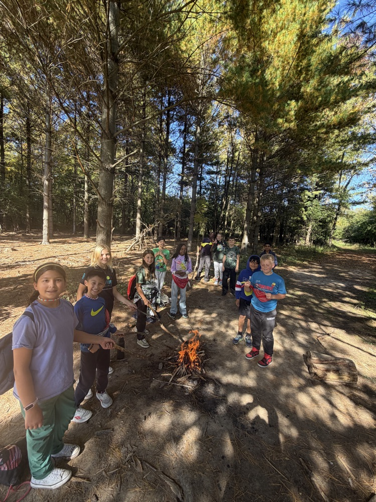 students making a fire