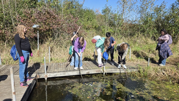 students on a dock