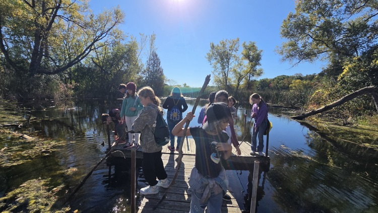 students on a dock