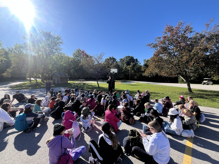 students listening to instructor