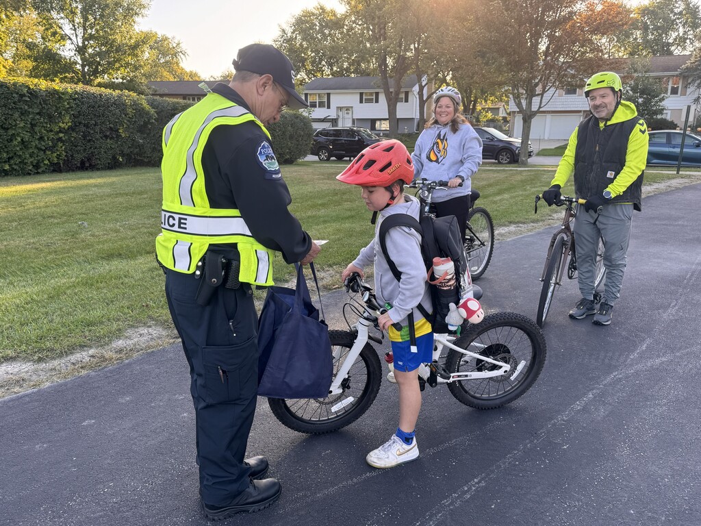 The officer with student and parents