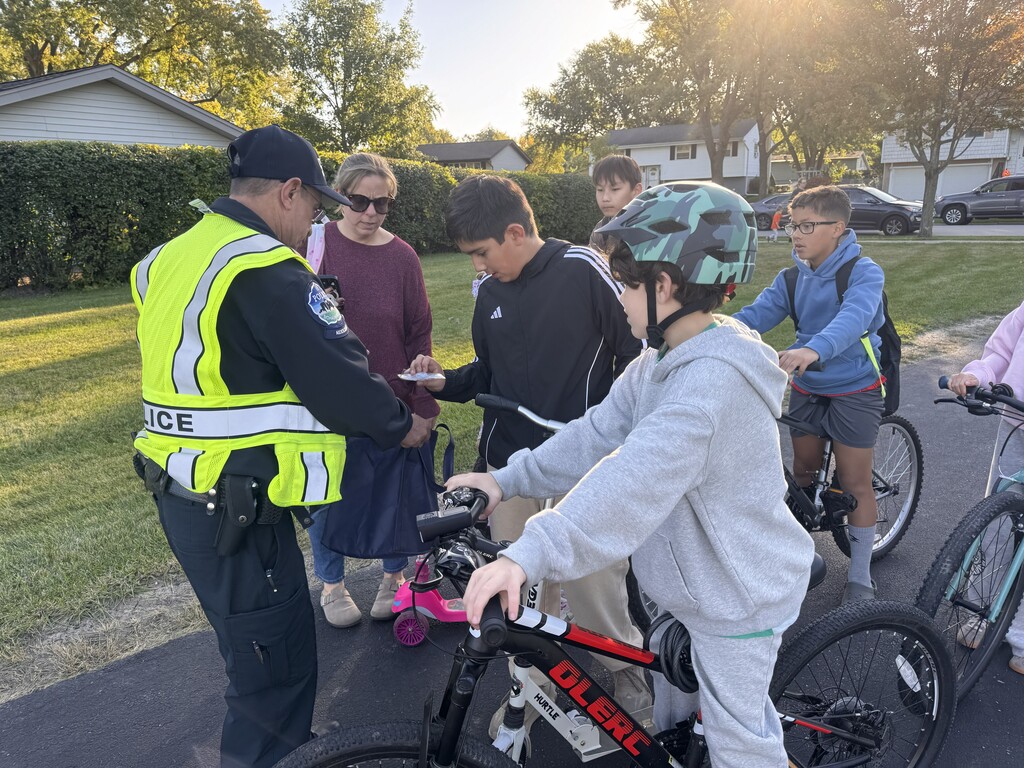 The officer with students 