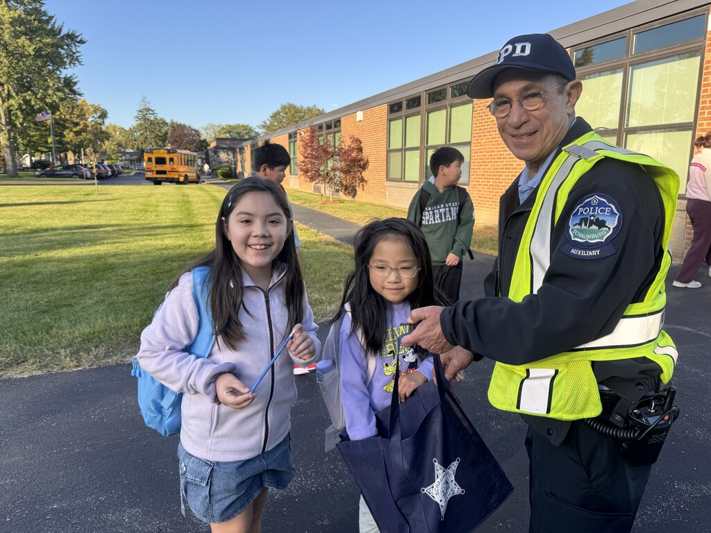 The officer with students 