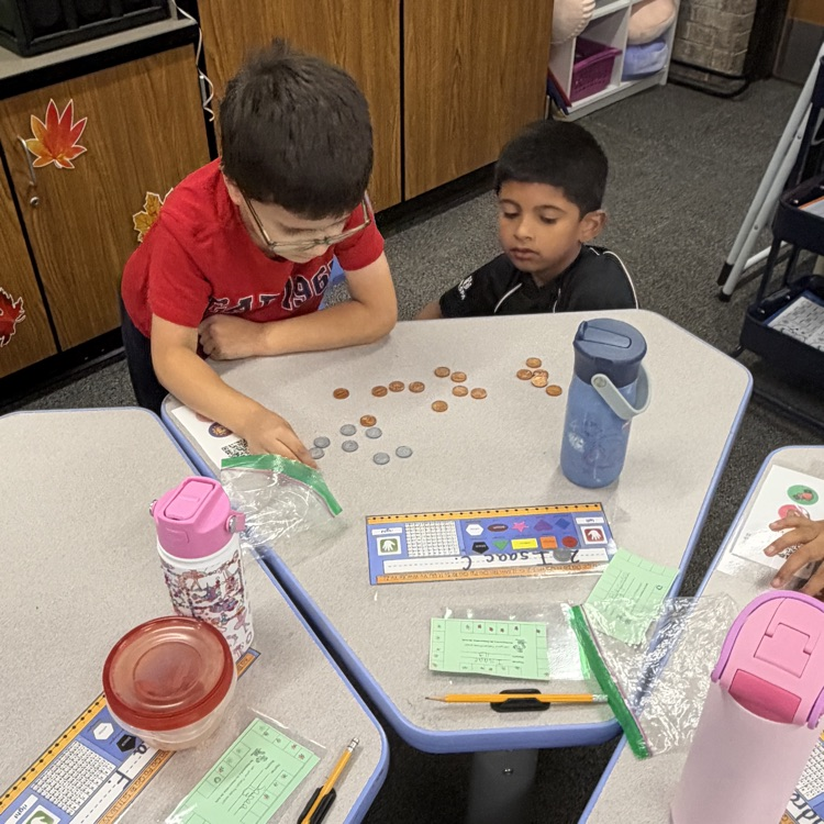students working with money
