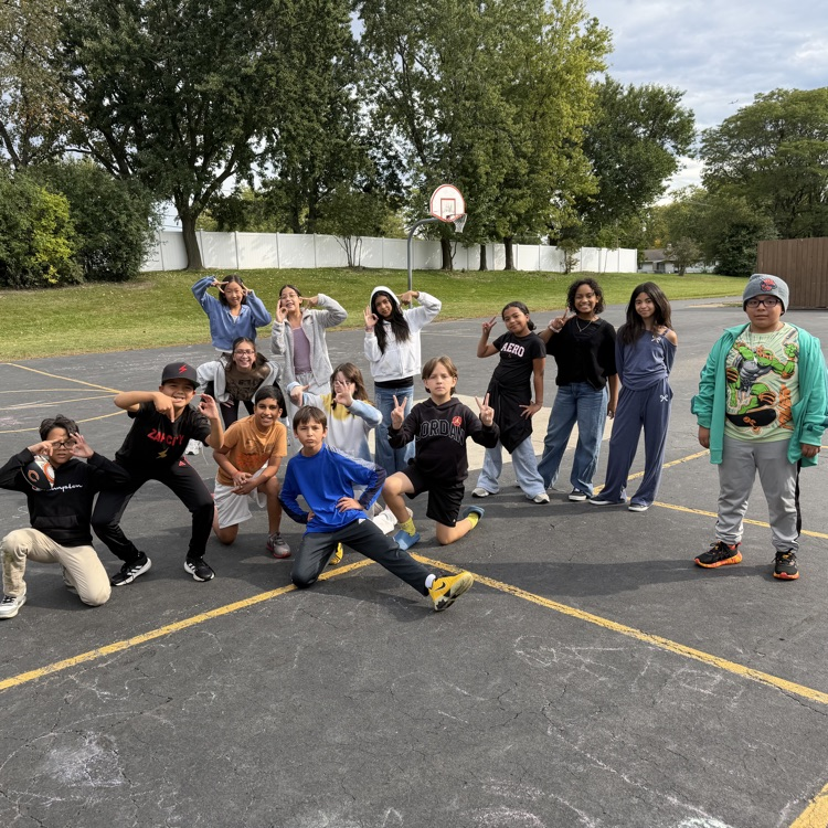 The 5th graders on the blacktop enjoying the weather! 