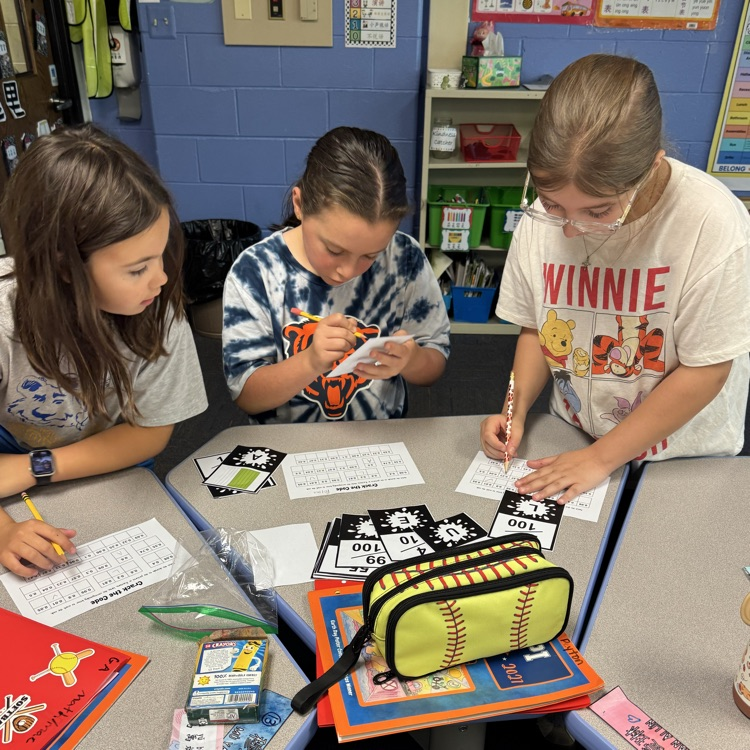 students working on math activity in a group