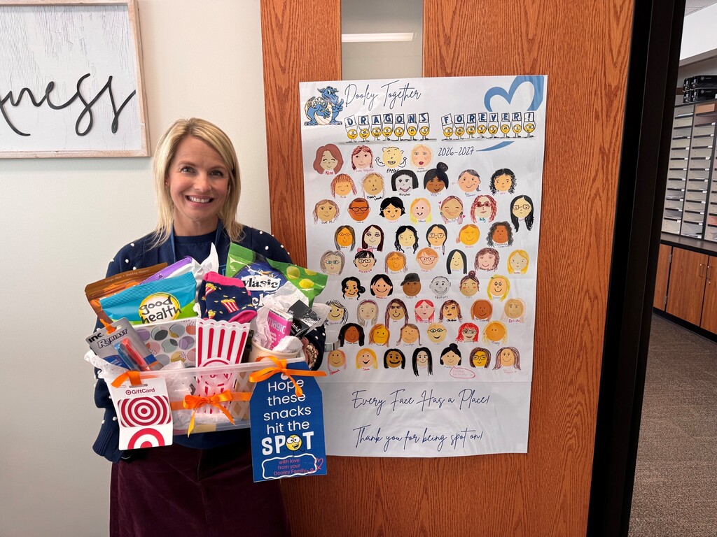 Mrs. Belt smiling and holding her treats