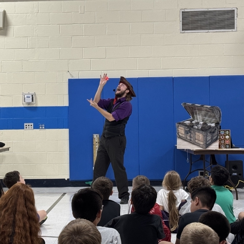 man wearing a pirate hat with a yo-yo 