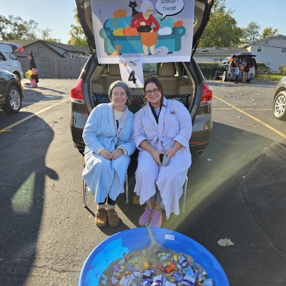 teachers dressed as old ladies for their car decor 