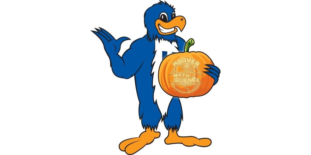 Herbie holding a pumpkin
